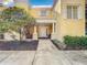 Welcoming townhome entrance with a covered porch, creating a charming curb appeal at 7510 Seven Eagles Way # 7510, Reunion, FL 34747