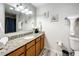 Bathroom with granite vanity and shower/tub combo at 7510 Seven Eagles Way # 7510, Reunion, FL 34747