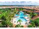 Expansive pool area with palm trees and lounge chairs at 7635 Oakmoss Loop, Davenport, FL 33837
