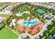 Aerial view of the community pool and lazy river at 7635 Oakmoss Loop, Davenport, FL 33837