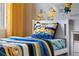 Minion-themed bedroom with twin bed and fun mural at 7635 Oakmoss Loop, Davenport, FL 33837