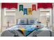 Magical Hogwarts-themed bedroom with a comfy bed and themed decor at 7635 Oakmoss Loop, Davenport, FL 33837