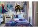 Frozen-themed bedroom with twin beds and Frozen mural at 7635 Oakmoss Loop, Davenport, FL 33837