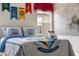 Themed bedroom with Hogwarts decor and comfortable bedding at 7635 Oakmoss Loop, Davenport, FL 33837
