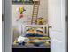 Minion-themed bedroom with twin bed and fun mural at 7635 Oakmoss Loop, Davenport, FL 33837