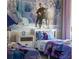 Frozen-themed bedroom with twin beds and Frozen mural at 7635 Oakmoss Loop, Davenport, FL 33837