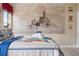 Bedroom with Hogwarts castle mural and themed bedding at 7635 Oakmoss Loop, Davenport, FL 33837