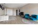 Bright and airy common area with comfy seating at 7635 Oakmoss Loop, Davenport, FL 33837