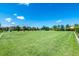 Expansive grassy area with soccer goals, providing ample space for recreation at 7635 Oakmoss Loop, Davenport, FL 33837