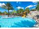 Resort-style pool with water slides and a lazy river at 7635 Oakmoss Loop, Davenport, FL 33837
