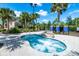 Relax in this community hot tub at 7635 Oakmoss Loop, Davenport, FL 33837