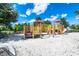 Playground with slides and playsets at 7635 Oakmoss Loop, Davenport, FL 33837