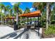 Relaxing shaded seating areas near the pool at 7635 Oakmoss Loop, Davenport, FL 33837