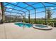 Relaxing pool and spa with a covered patio at 7635 Oakmoss Loop, Davenport, FL 33837