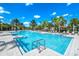 Large resort-style pool with ample lounge chairs at 7635 Oakmoss Loop, Davenport, FL 33837
