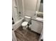 Bathroom with granite vanity, bathtub and flooring at 106 Orchid Ct, Kissimmee, FL 34759