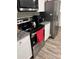 Modern kitchen with stainless steel appliances and granite countertops at 106 Orchid Ct, Kissimmee, FL 34759