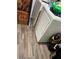 Laundry room with washer, dryer and vinyl flooring at 106 Orchid Ct, Kissimmee, FL 34759