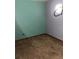 Empty bedroom with teal and purple walls at 1604 Royal Palm Dr, Edgewater, FL 32132