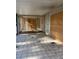 Covered patio with tiled flooring and plywood wall at 1604 Royal Palm Dr, Edgewater, FL 32132