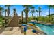 Relaxing lazy river with water features and wooden bridge at 2897 Simile St, Kissimmee, FL 34746
