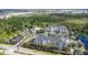 Aerial view of apartment community with pool and pond at 3176 Feltrim Pl # 102, Kissimmee, FL 34747