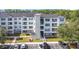 Three-story apartment building with ample parking at 3176 Feltrim Pl # 102, Kissimmee, FL 34747