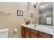 Bathroom with vanity, toilet, and shower at 3176 Feltrim Pl # 102, Kissimmee, FL 34747