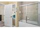 Bathroom with a bathtub, shower, and updated vanity at 3176 Feltrim Pl # 102, Kissimmee, FL 34747