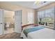 Bedroom with a double bed and en-suite bathroom at 3176 Feltrim Pl # 102, Kissimmee, FL 34747