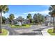 Gated entrance to community with fountain and landscaping at 3176 Feltrim Pl # 102, Kissimmee, FL 34747