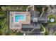 L-shaped pool with plenty of lounge chairs at 3176 Feltrim Pl # 102, Kissimmee, FL 34747