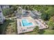 L shaped pool with clubhouse and surrounding amenities at 3176 Feltrim Pl # 102, Kissimmee, FL 34747