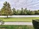 Grass backyard with a white privacy fence at 3480 Home Town Ln, Saint Cloud, FL 34769