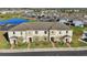 Townhouse community with pond and ample parking at 439 Annabelle Way, Davenport, FL 33837