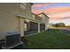 Screened patio and AC unit in backyard at 439 Annabelle Way, Davenport, FL 33837