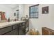 Bathroom with vanity, shelving and wicker storage at 439 Annabelle Way, Davenport, FL 33837
