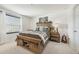 Cozy bedroom with wooden bed frame and window coverings at 439 Annabelle Way, Davenport, FL 33837