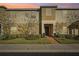 Two-story townhome with brick walkway at 439 Annabelle Way, Davenport, FL 33837
