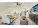 Living room boasts an open floor plan and a view into the kitchen area at 439 Annabelle Way, Davenport, FL 33837