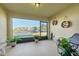 Screened patio with seating, plants, and view of community at 439 Annabelle Way, Davenport, FL 33837