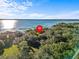 Aerial view showing home's location on lakefront lot at 5100 Helen Ct, St Cloud, FL 34772