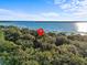 Aerial view showcasing property location near the lake at 5100 Helen Ct, St Cloud, FL 34772