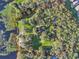 Aerial view showing home on a large lot with water access at 5100 Helen Ct, St Cloud, FL 34772