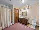 Bathroom with shower/tub combo, vanity and toilet at 5100 Helen Ct, St Cloud, FL 34772