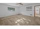 Spacious bedroom with neutral carpeting and built-in shelving at 5100 Helen Ct, St Cloud, FL 34772