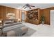 Main bedroom with built-in shelves and wood-paneled walls at 5100 Helen Ct, St Cloud, FL 34772