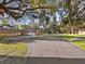 Asphalt driveway providing access to the home and garage at 5100 Helen Ct, St Cloud, FL 34772