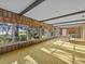 Spacious game room with pool table and large windows at 5100 Helen Ct, St Cloud, FL 34772