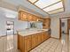 View of kitchen with wood cabinets and appliances at 5100 Helen Ct, St Cloud, FL 34772